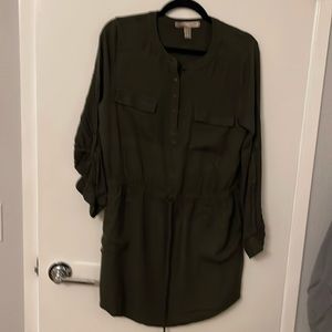A short dress dark green 4 pockets long sleeve and option of folding the sleeve.